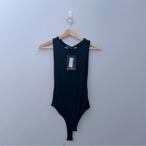 PrettyLittleThing Tops - NWT high neck black bodysuit soft jersey knit drop sides size 4​​